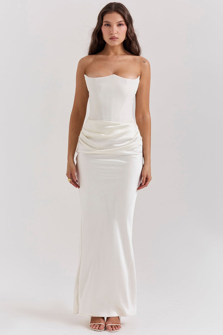 Sophisticated purple strapless maxi dress, suitable for a wedding guest or a formal evening party.