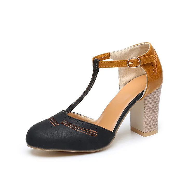 Women's two-tone block heel shoes on a model, showcasing elegant footwear and comfortable heels
