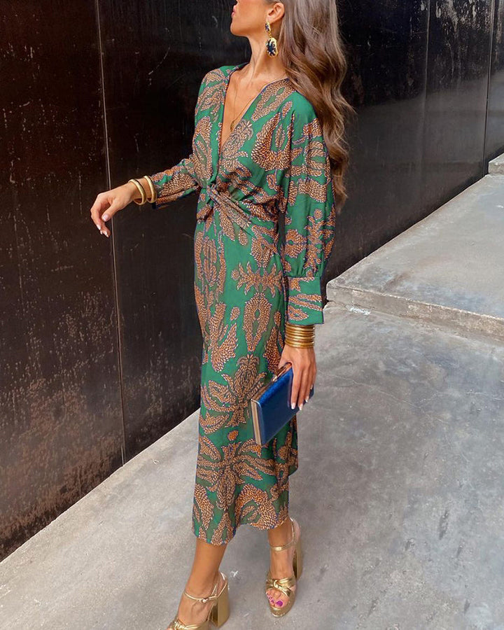 Stylish women's V-neck long sleeve midi dress. Versatile patterned elegant dress ideal for fall, spring, day to night wear.
