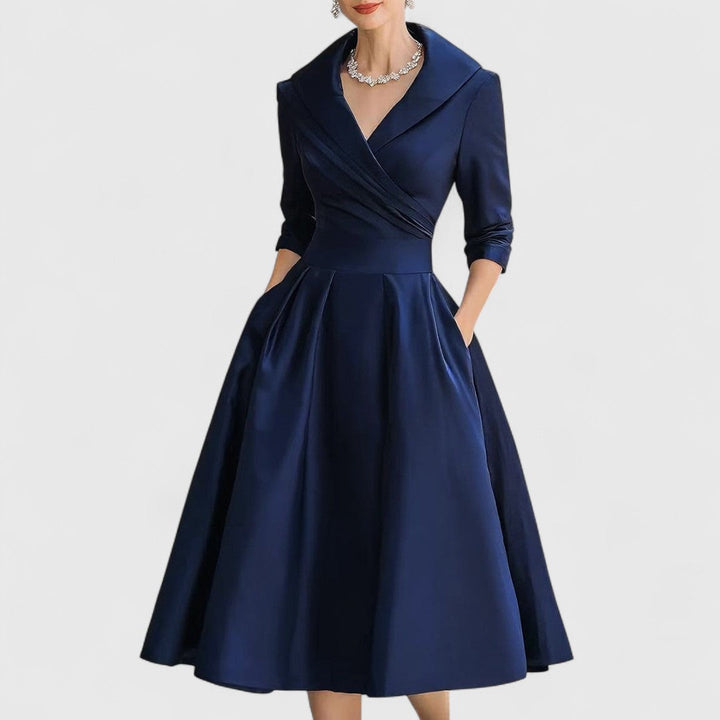 Elegant V-neck midi dress for women, with 3/4 sleeves & pockets. Versatile for casual chic or occasion wear.