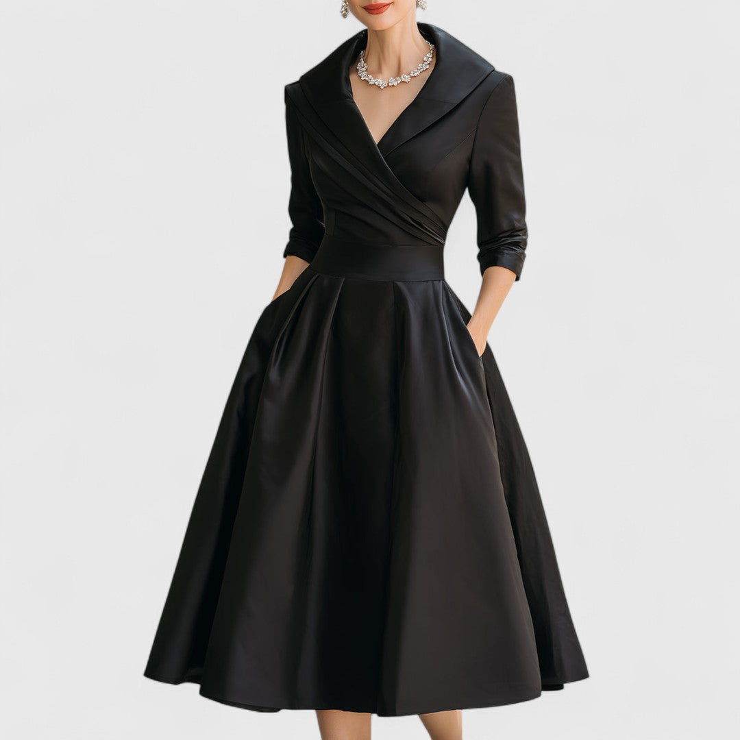 Women's chic V-neck midi dress featuring practical pockets and a flattering flared skirt. Ideal for women's fashion.