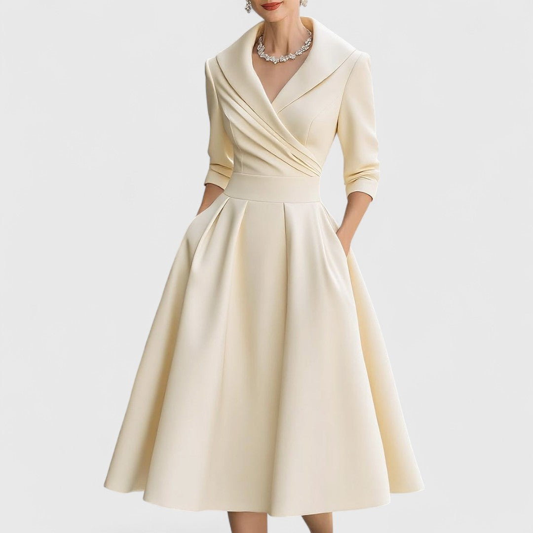 Flattering V-neck midi dress for women, with 3/4 sleeves, pockets, and an elegant flared silhouette. Perfect fashion.