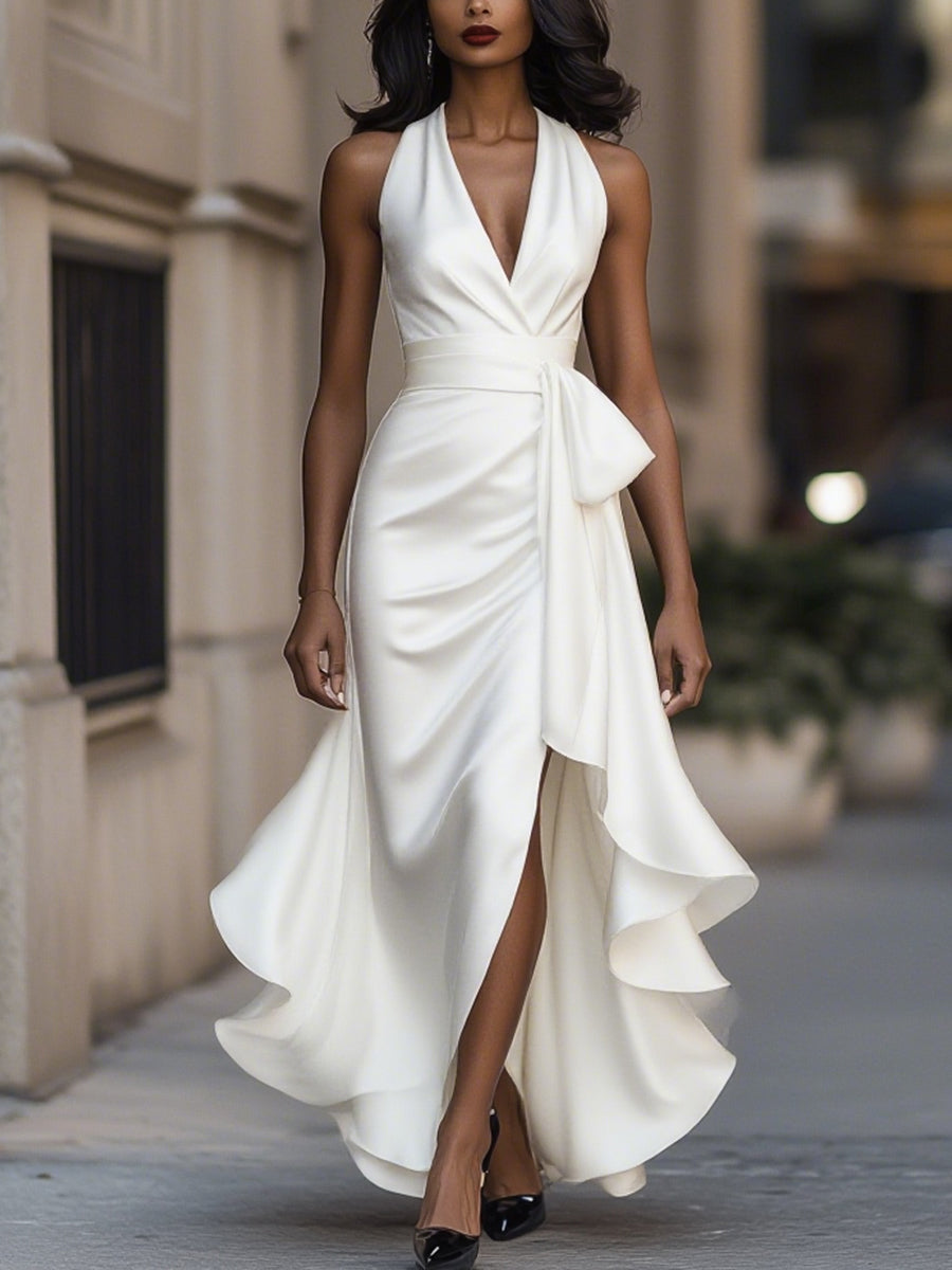 Women's elegant midi dress, V-neck, sleeveless & stylish wrap design for parties.