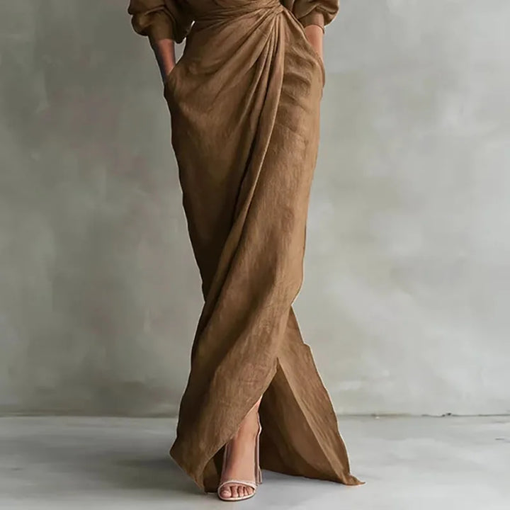 Black elegant V-neck wrap waist maxi dress. Slim fit women's evening dress, perfect for formal occasions.