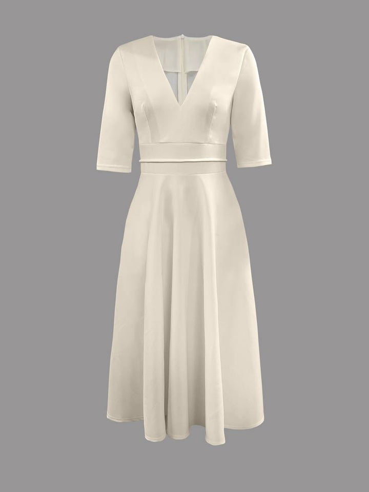 Chic white flared midi dress, a versatile and elegant choice for any formal event or wedding.