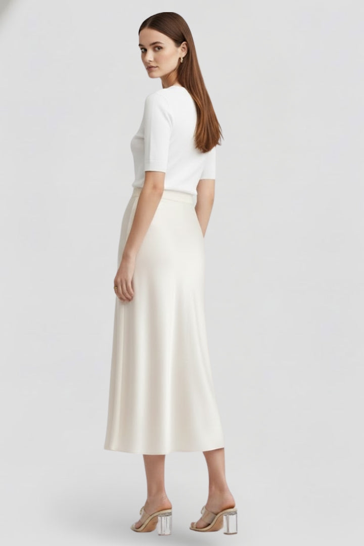 Beautifully draped white midi skirt for women, featuring a stylish high waist design.
