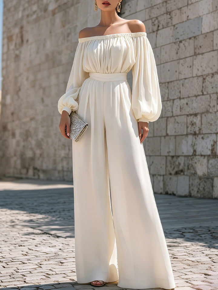 Elegant white off-shoulder maxi dress with bishop sleeves, perfect for parties and special occasions.