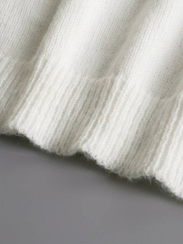 Stylish women's top with feminine ruffles and unique decorative buttons, a must-have for spring.