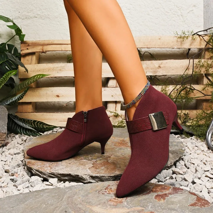 Close-up of a women's pointed toe stiletto heel in rich wine red, showcasing the sleek design.