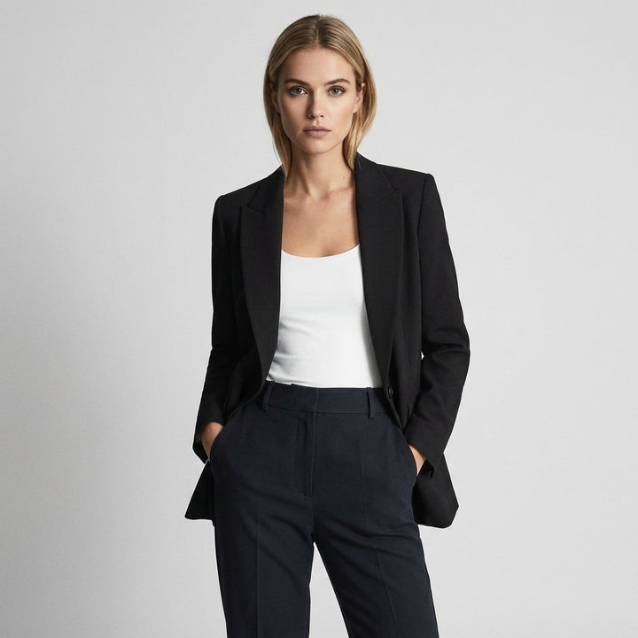 Elegant women's 2-piece suit set: tailored blazer & pants for formal business wear.