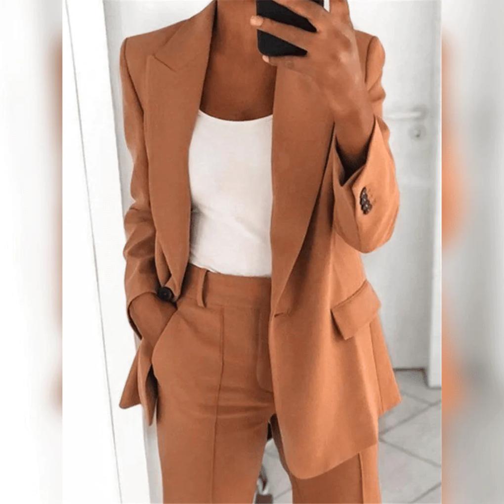 High-quality tailored women's 2-piece suit. Elegant blazer & pants for sophisticated business attire.