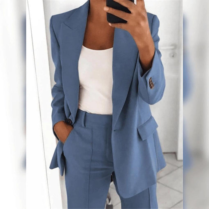Stylish women's blazer, part of a professional 2-piece suit. Ideal for office wear & power dressing.