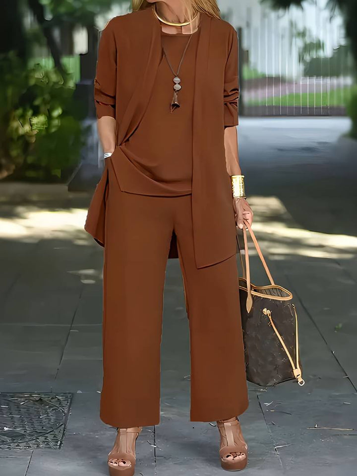 Chic women's 3-piece set featuring an open-front long jacket & comfortable wide-leg pants. Cotton blend.