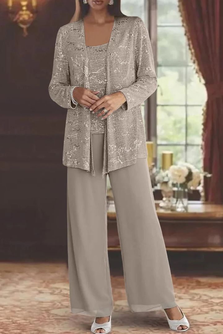 Women's glamorous sequin wide leg pant suit set in motion, perfect for an evening out.