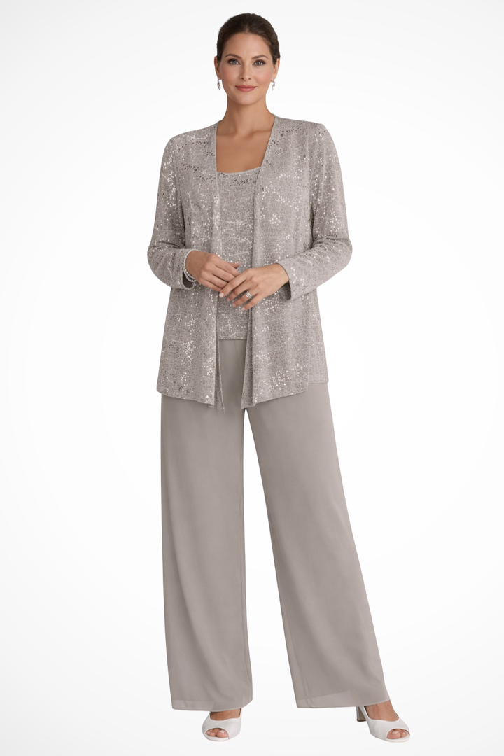 Close-up of sparkling sequin embellishments on an elegant women's wide leg pant suit set.