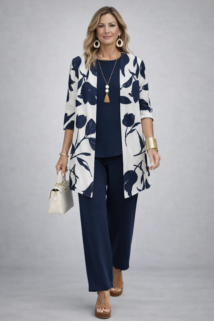 Women's modern 3-piece set: blazer, top & trousers. Coordinated fashion for versatile elegant wear.