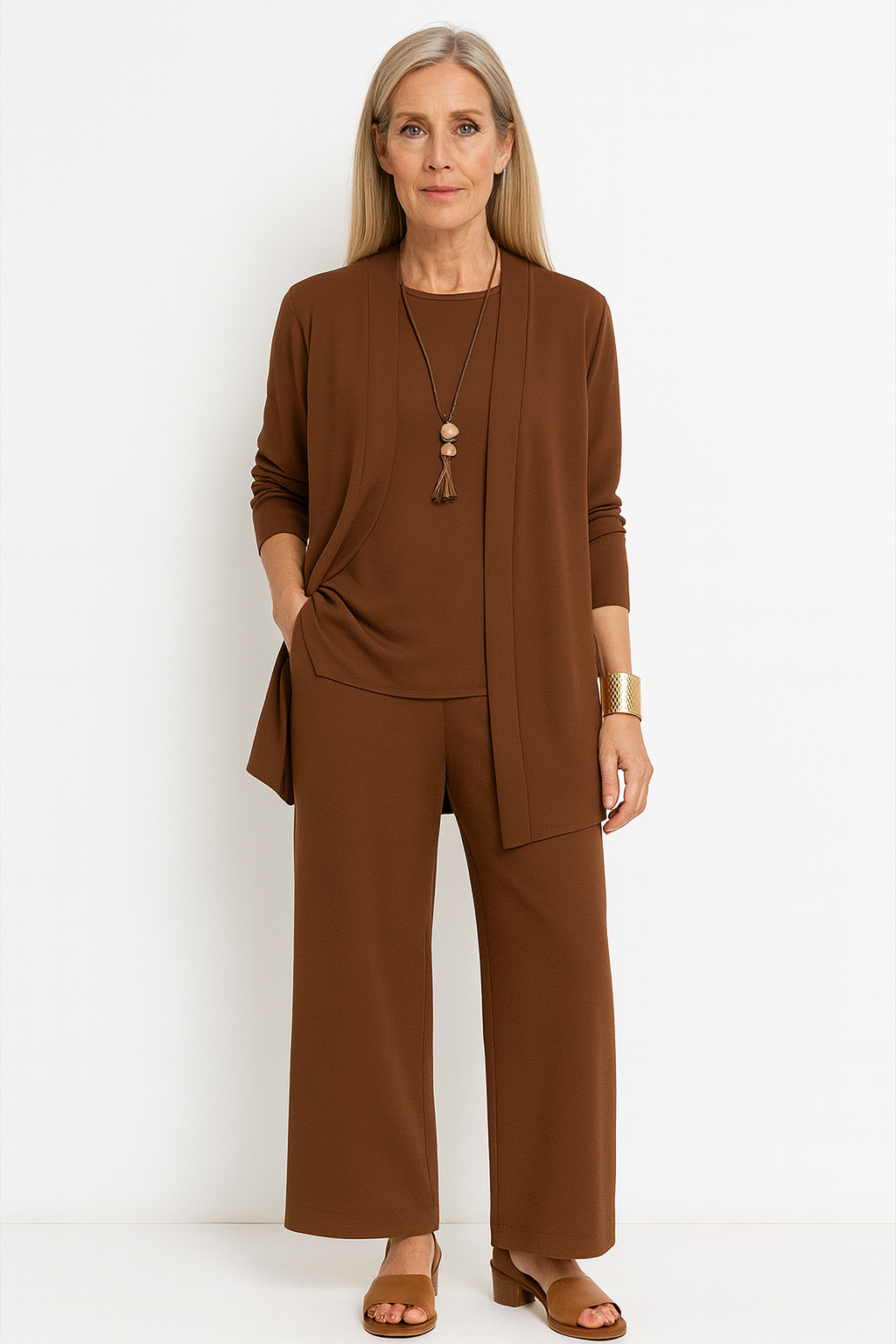 Modern women's 3-piece elegant pants suit. Fashionable & comfortable for versatile business casual style.