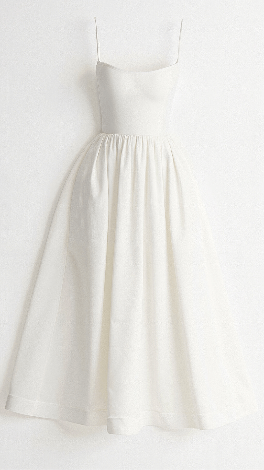 Comfortable women's A-line midi dress with thin spaghetti straps. Perfect for spring & summer fashion.
