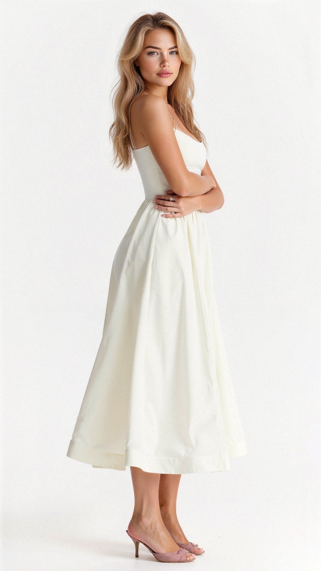 Stylish women's elegant midi dress. A-line silhouette, spaghetti straps, ideal for parties & warm weather.