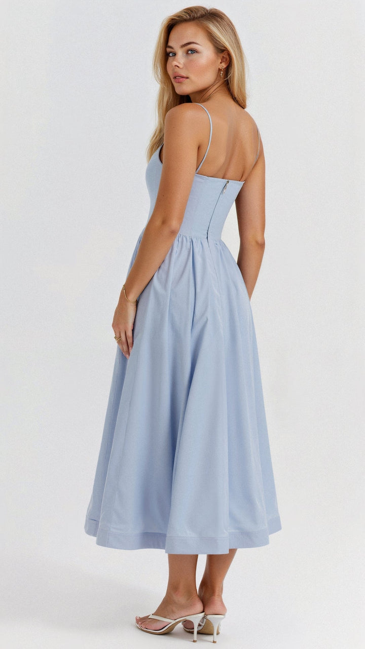 Feminine A-line midi dress for women, with delicate spaghetti straps. Perfect elegant look for special occasions.