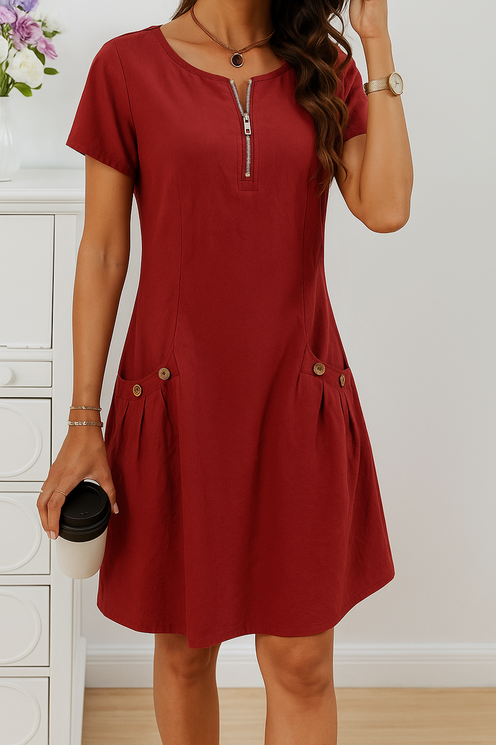 Stylish women's midi summer dress, A-line cut with decorative buttons, offering a comfortable and flattering fit.