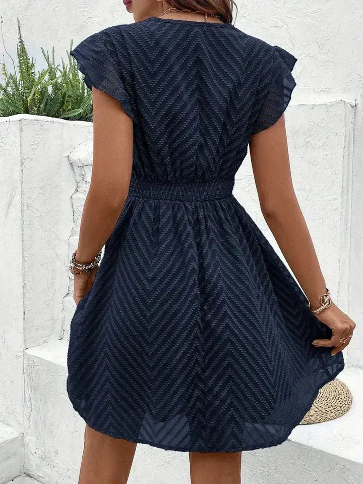 Comfortable & elegant white summer dress for women, with a flattering sweetheart neckline & flared silhouette.