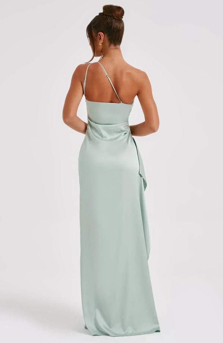 Fashion shot of a women's embellished one-shoulder maxi evening dress