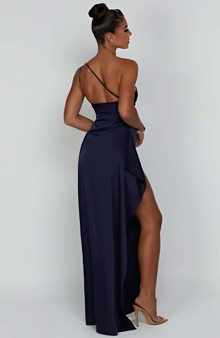 Luxurious gold one-shoulder maxi dress, an opulent choice for festive evening wear