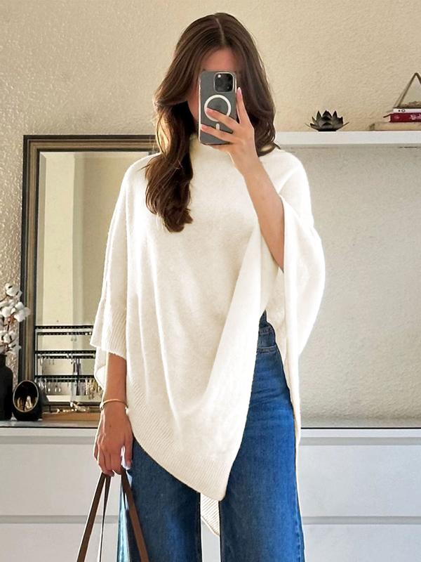 Elegant women's asymmetrical draped cape, a sophisticated fashion accessory for versatile layering and coverup.
