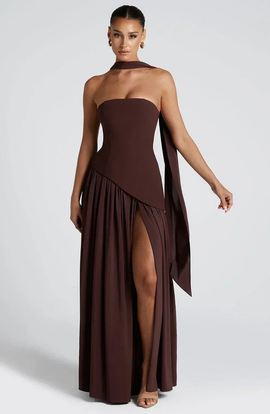 Golden tan asymmetric maxi dress, a unique and stylish option for formal evening events.