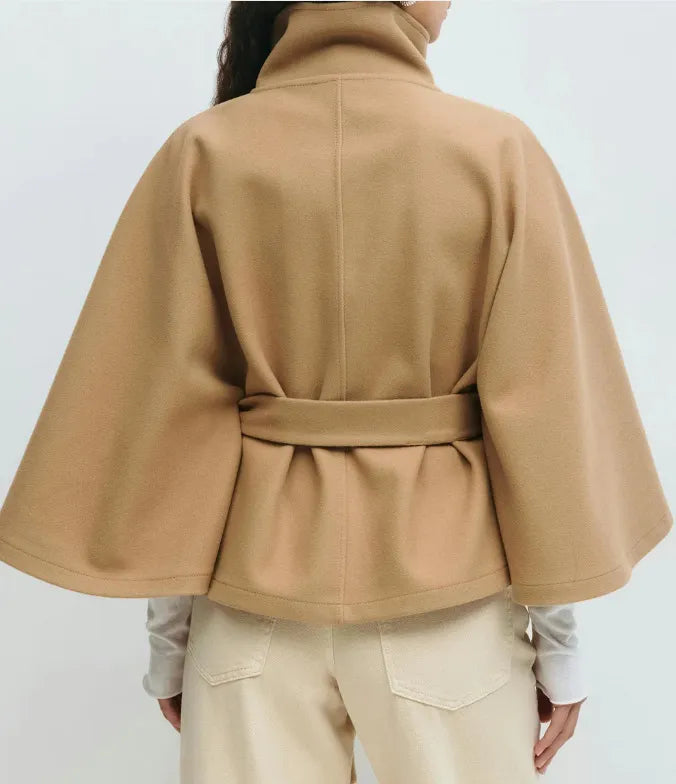 Chic women's spring cape coat with a high neck and adjustable belt, showcasing a stylish silhouette.