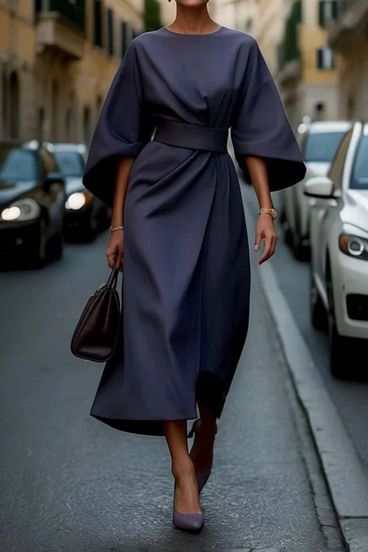 Stylish A-line midi dress for women, featuring a flattering belt and wide sleeves, ideal for elegant casual wear.