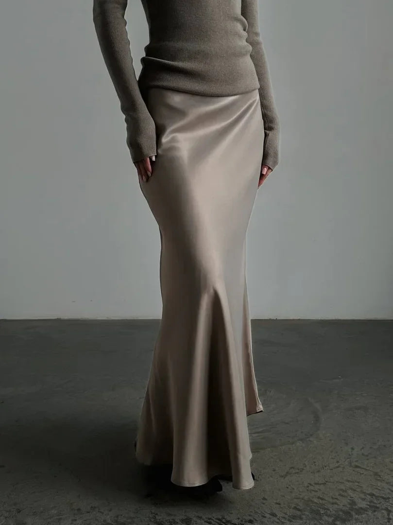 Sophisticated formal evening skirt with a flowing fishtail hem and high waist.