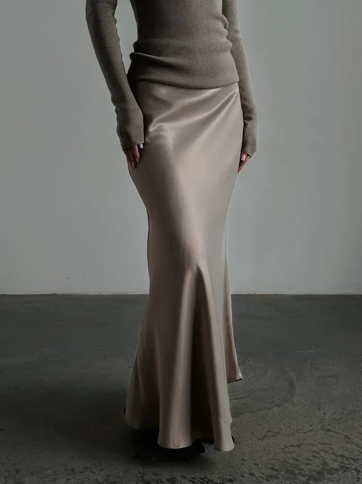 Sophisticated formal evening skirt with a flowing fishtail hem and high waist.