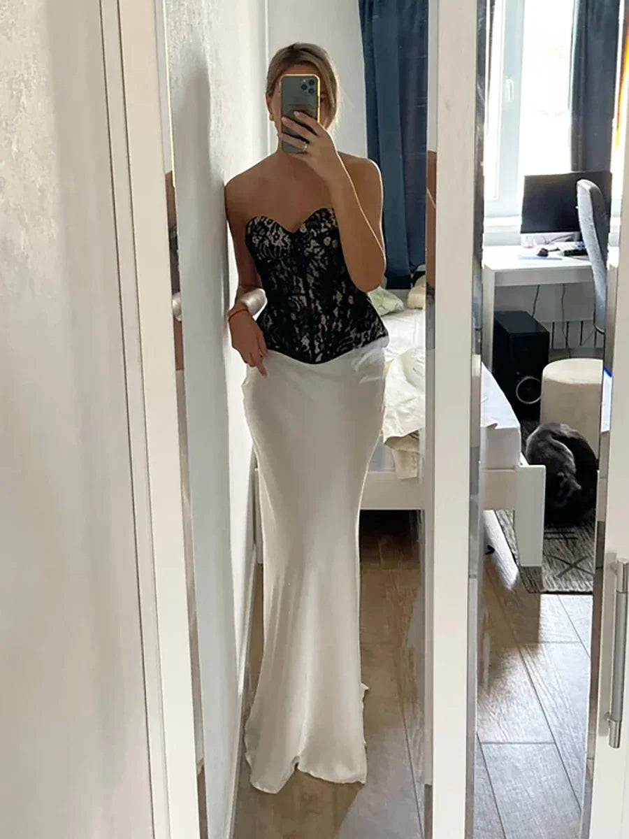 Graceful maxi skirt, high-waisted with a dramatic fishtail hem for evening events.