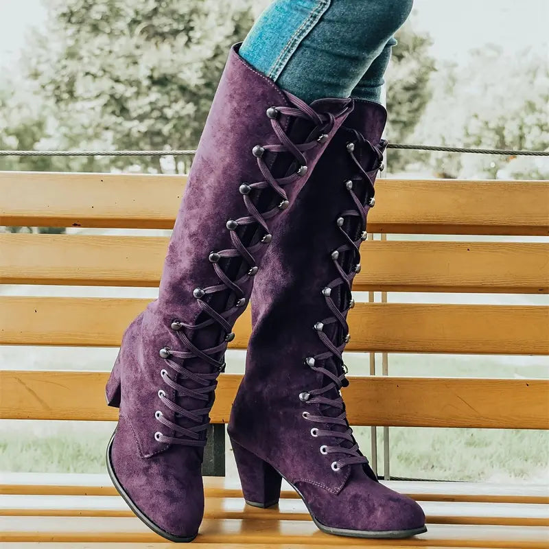 Elegant women's black lace-up block heel long boots, perfect for winter fashion and tall boot styling.