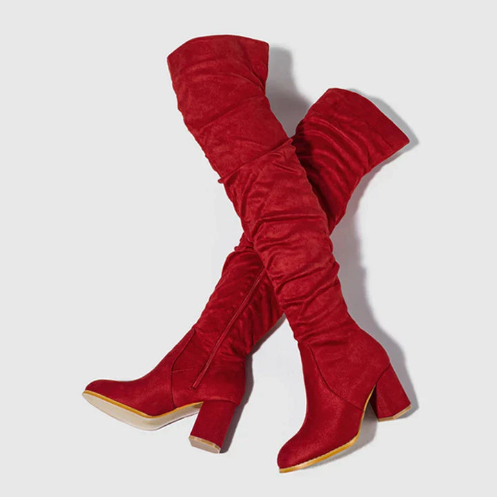 Pair of black over-the-knee heeled footwear, presented neatly for an online product display