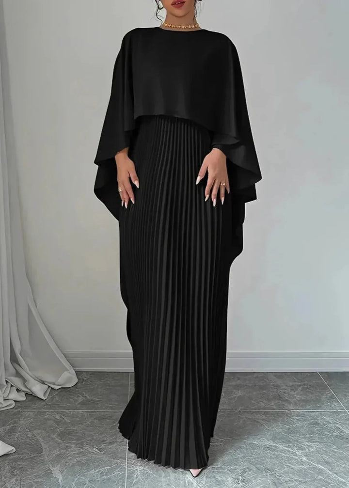 Long, elegant women's pleated maxi dress with a sophisticated cape overlay, perfect formal wear for events.