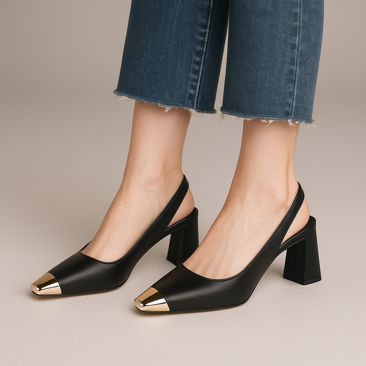 Side view of women's comfortable black block heel slingback shoe, showcasing the sturdy block heel