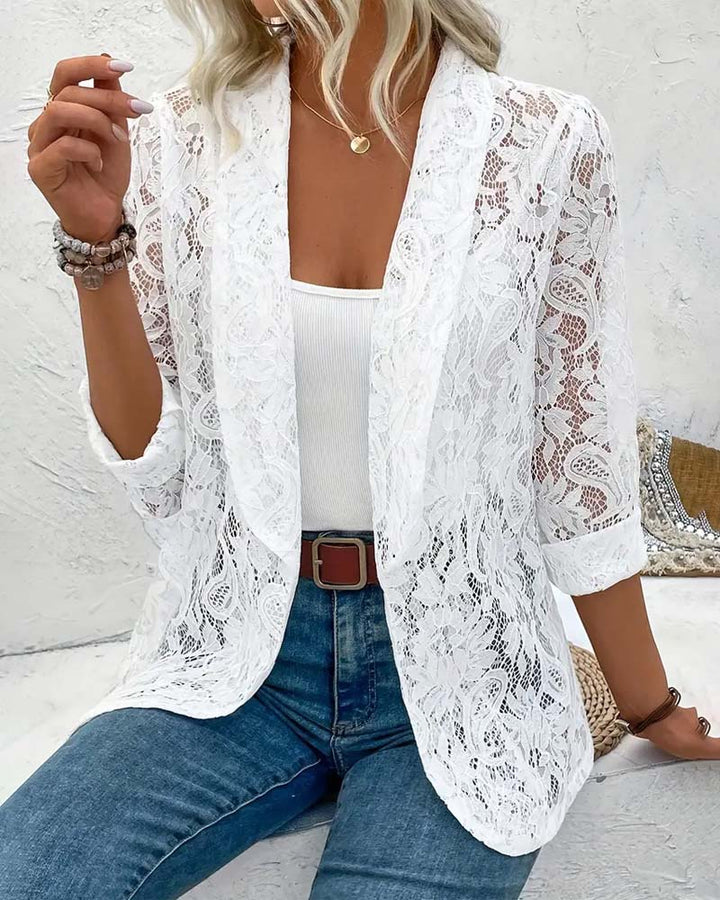 Elegant women's blazer with delicate lace trim, perfect for sophisticated office wear or a chic formal look.