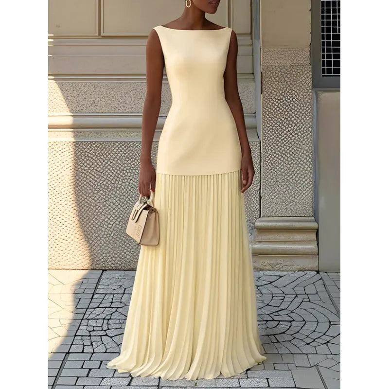 Stylish women's boat neck pleated maxi dress. Elegant and flowing, suitable for both formal and casual summer occasions.