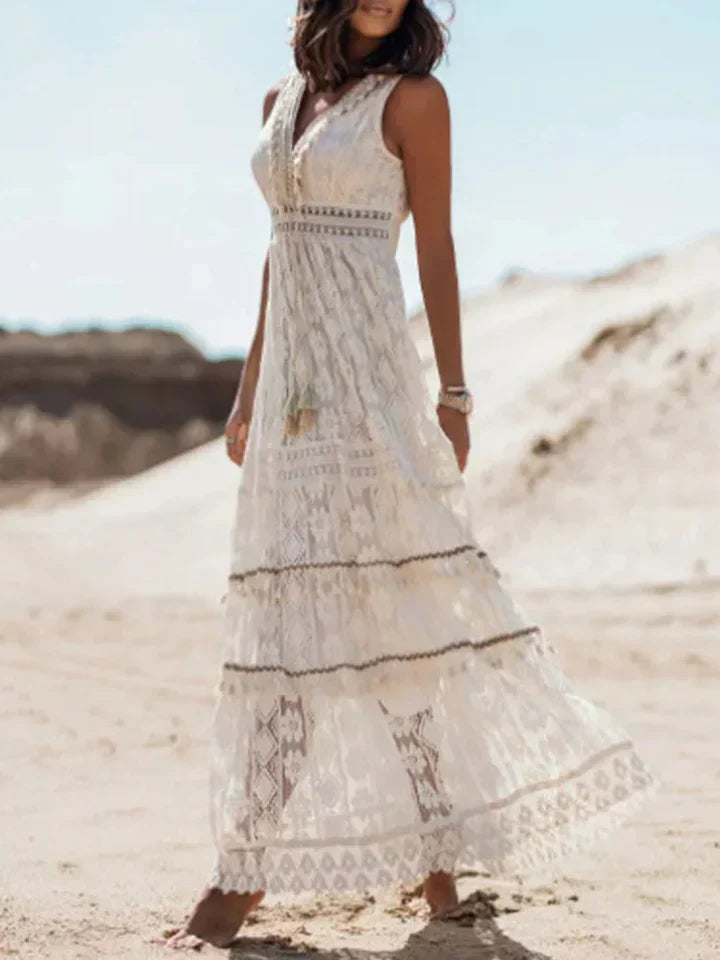 Comfortable & chic women's flowy bohemian maxi dress, featuring elegant lace and graceful flared sleeves for casual wear.