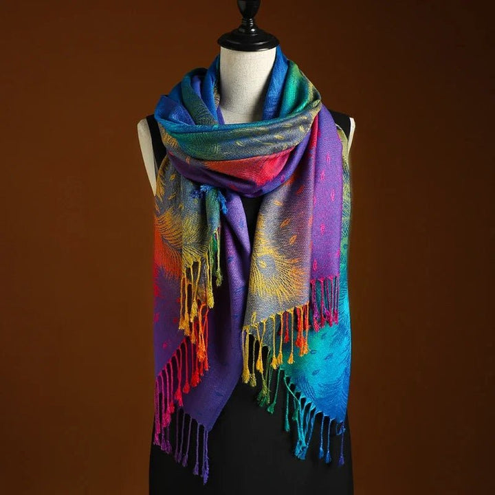 Fashionable women's peacock pattern scarf. Soft bohemian fringe wrap, ideal for elegant ladies' accessories.