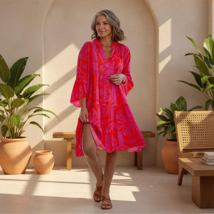 Elegant Women's Boho Chic Midi Dress. Perfect for summer vacations & relaxed spring fashion. Flowy print.