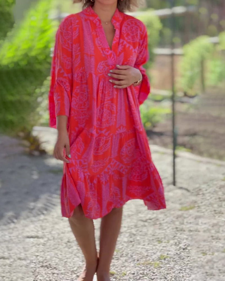 Relaxed fit women's midi dress with vibrant boho print. Chic and elegant, perfect for summer fashion & vacation.