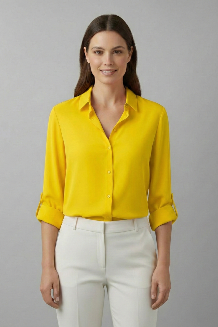 Modern women's elegant button-down blouse, long sleeve, classic collar. A versatile top for professional & chic.