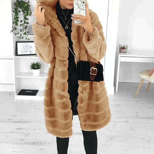 Plush faux fur button-down coat for women, an elegant and warm design for winter fashion outerwear.