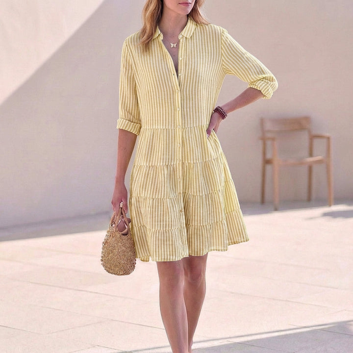 Women's elegant V-neck mini dress, button-down with 3/4 sleeves and a chic tiered skirt for versatile wear.
