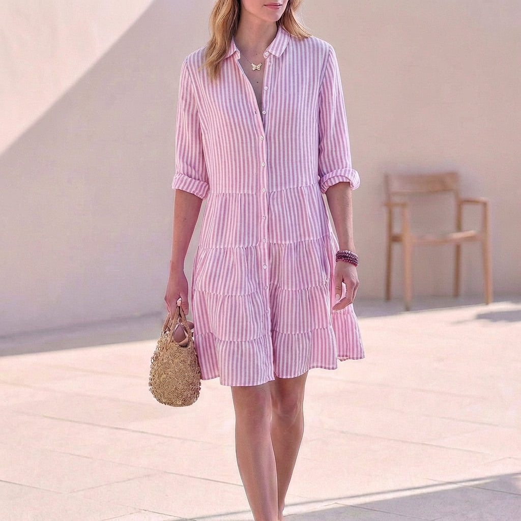 Chic women's button-down shirt mini dress, featuring a tiered design, V-neck, and comfortable 3/4 sleeves.