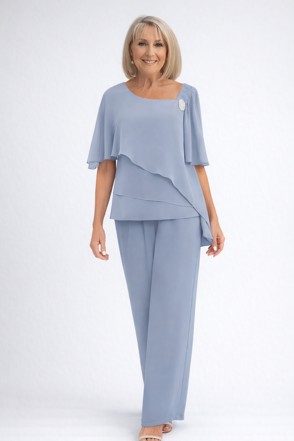 Elegant women's cape top and straight leg trouser two-piece set for formal events & evening wear.